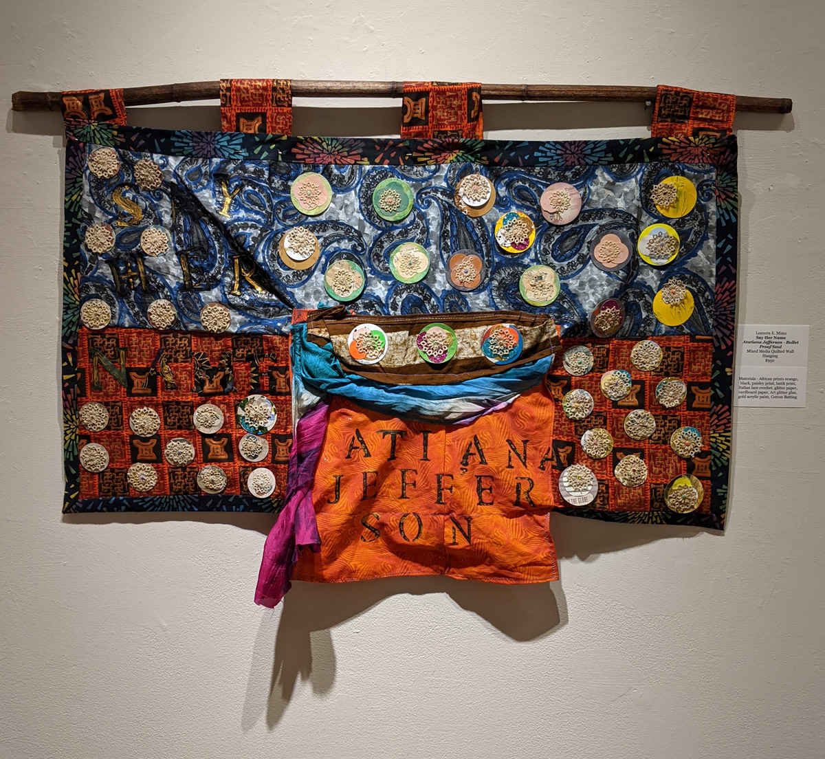 Leanora E. Mims • <em>Say Her Name: Atatiana Jefferson, Bullet Proof Soul</em> • Mixed media quilted wall hanging • 23″×19½″ • $950.00