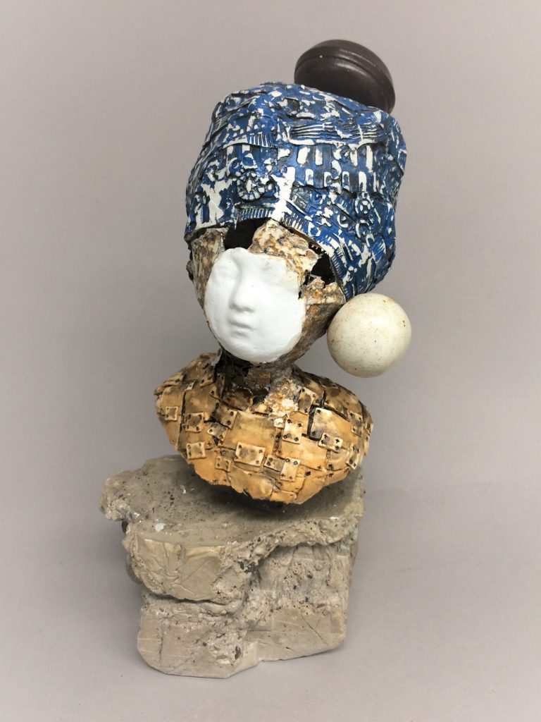 Tatiana Patrone • <em>A girl with a pearl earring</em> • Wire, paperclay, found objects, concrete • 12″×6″×6″ • $600.00