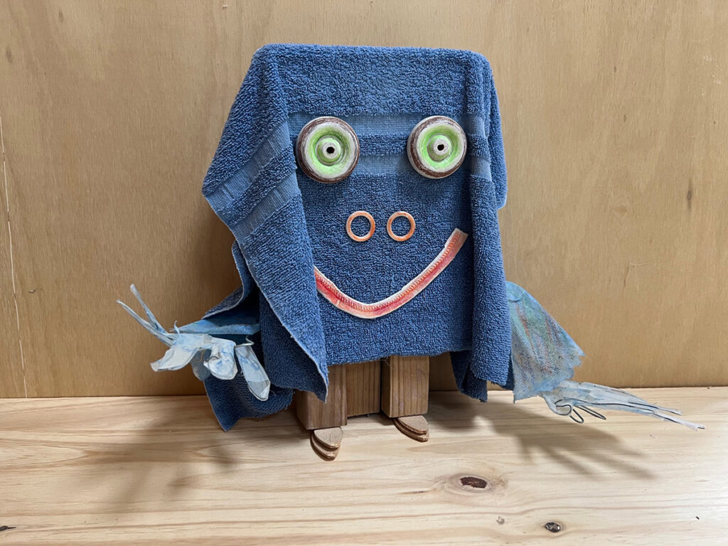 Mary Ann Bowman • <em>Box Guy</em> • Wood, fabric • 15″×13″×10″ • $475.00<a class="purchase" href="https://state-of-the-art-gallery.square.site/product/mary-ann-bowman-box-guy/1127" target="_blank">Buy</a>