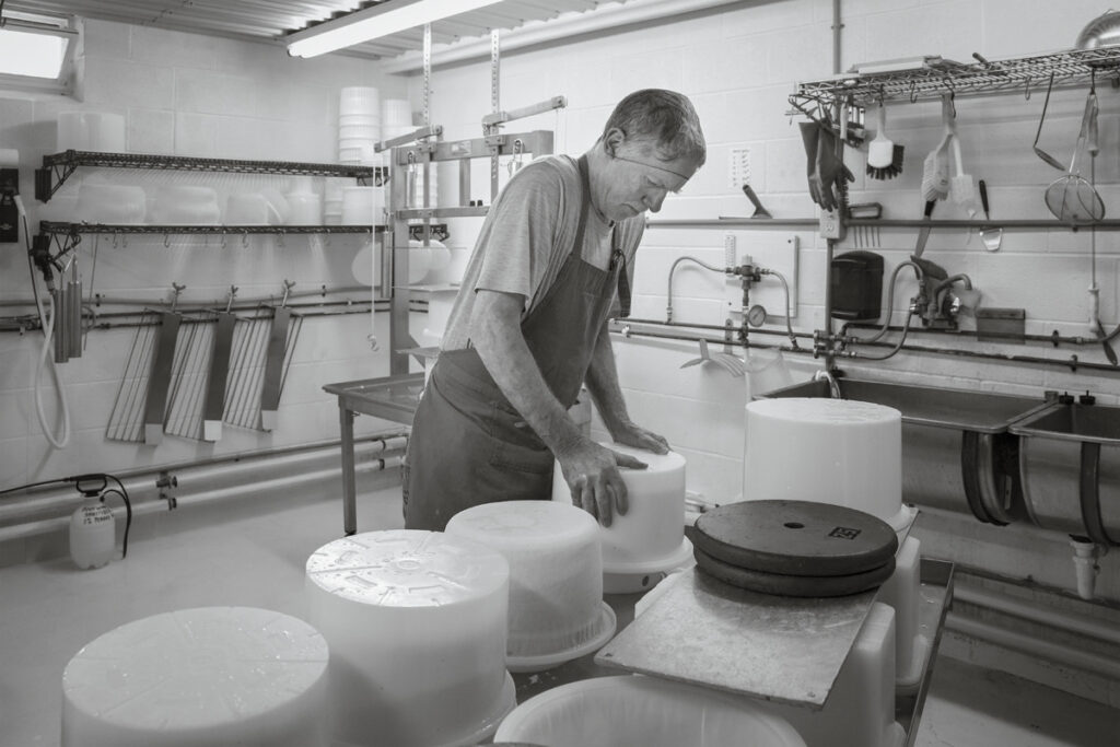 Susan C. Larkin • <em>Cal Makes Cheese</em> • Archival digital print • 24″×18″ • $300.00