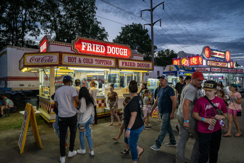 Harry Littell • <em>Tioga County Fair: Fried Dough, 2022</em> • Archival digital print • 28″×21″ • $475.00<a class="purchase" href="https://state-of-the-art-gallery.square.site/product/harry-littell-tioga-county-fair-fried-dough-2022/1830" target="_blank">Buy</a>
