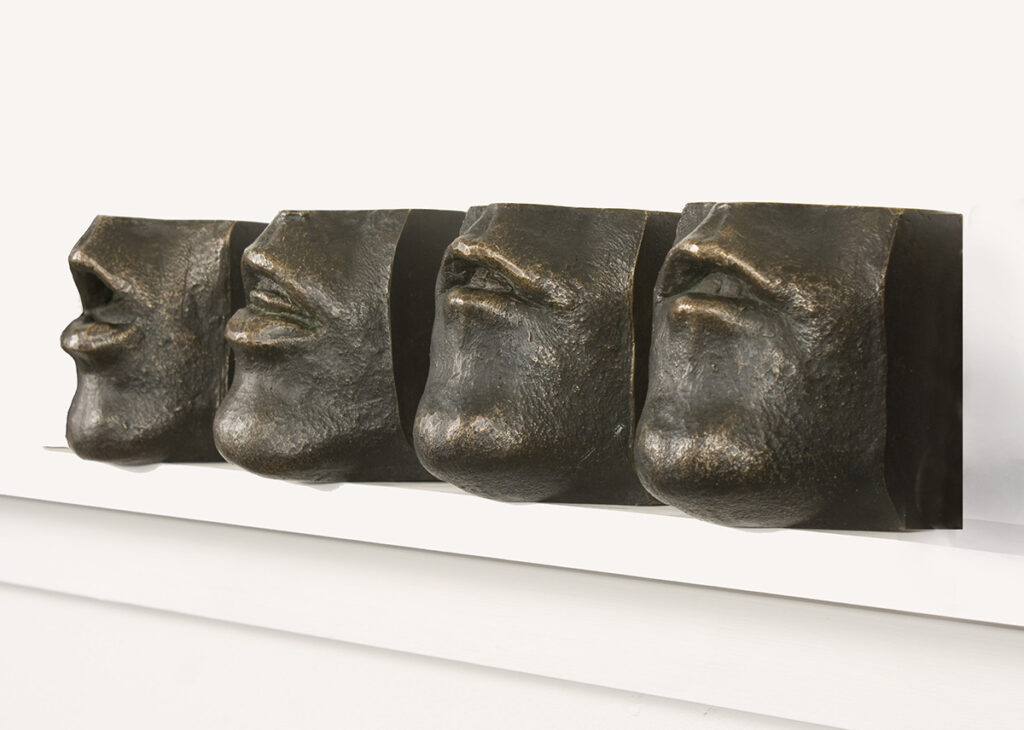 Rob Licht • <em>The Failure of Communication (in four parts)</em> • Bronze, wood shelf • 6″×2″×3″ • $2,800.00