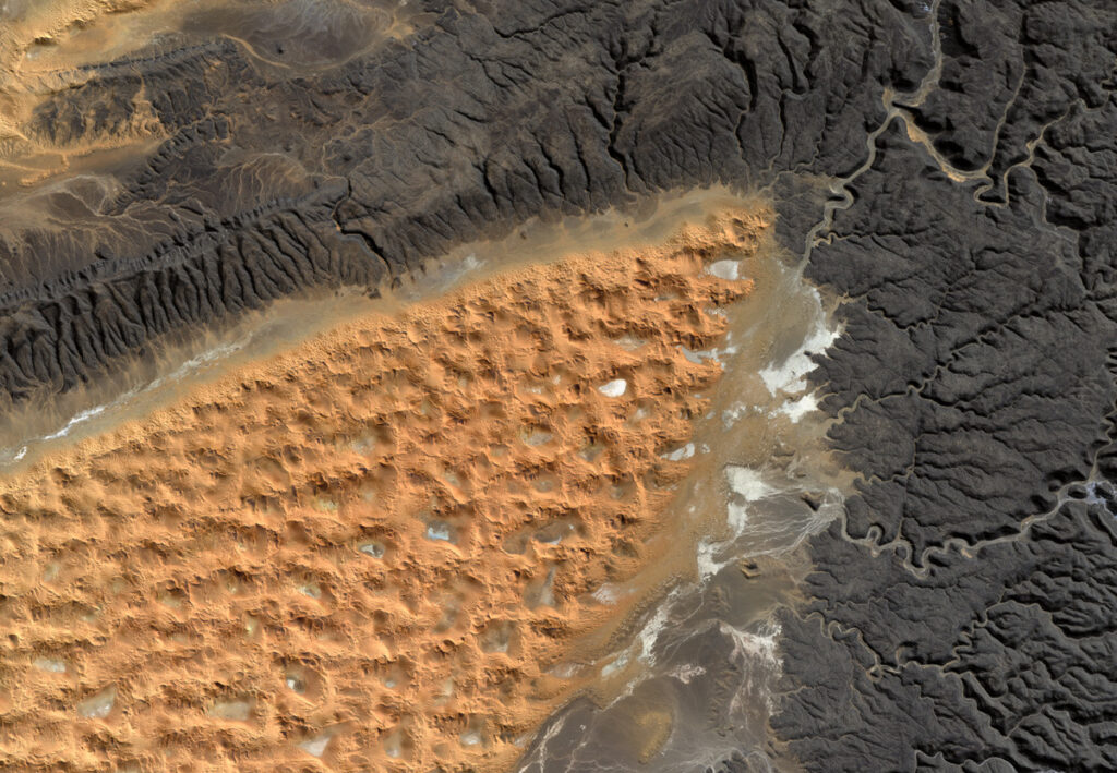 Jay Hart • <em>The Prow of the Tifernine Dunes</em> • Natural color Landsat with elevation • 16″×11″ • $220.00