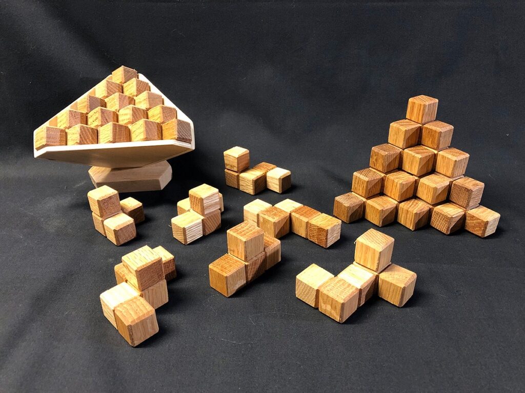Eva M. Capobianco • <em>Pyramid Puzzle</em> • Reused wood • 6″×6″×4″ • $18.00