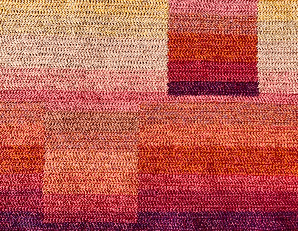 Saundra Goodman • <em>Sunset in July</em> • Hand crochet using cotton threads • 23″×13¾″ • $225.00
