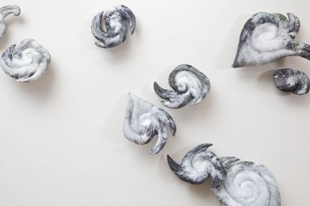 Christine Chin • <em>Stuffed Storms: 2020 Atlantic Tropical Storm Season</em> • Stuffed and quilted archival ink prints on fabric with hand embroidery. • 138″×72″×2″ • $3,500.00