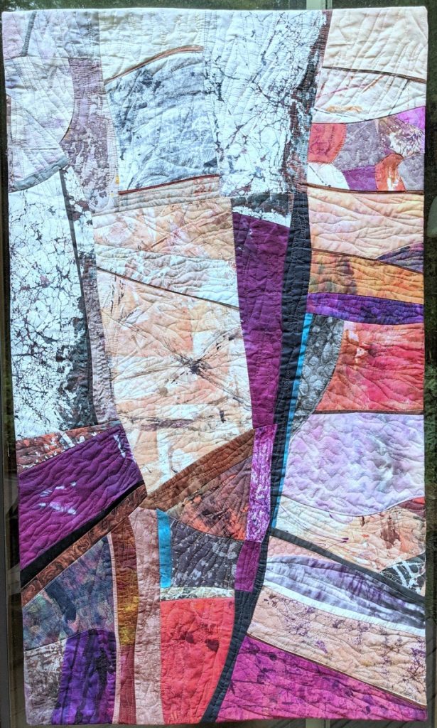 Barbara Behrmann • <em>Watch Your Step</em> • Original artist-dyed fabrics • 40″×23″ • $875.00<a class="purchase" href="https://state-of-the-art-gallery.square.site/product/barbara-behrmann-watch-your-step/778" target="_blank">Buy</a>