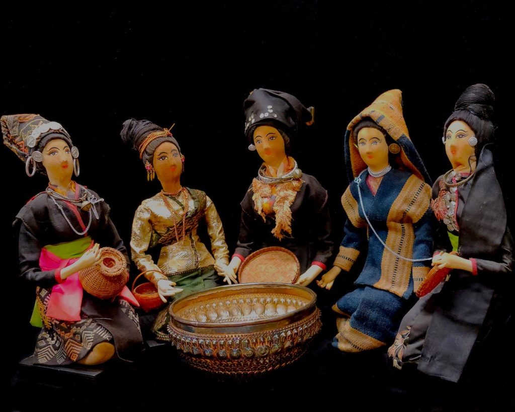 Nancy V Ridenour • <em>Lao Ethnic Dolls</em> • Digital image on canvas • 20″×16″ • $150.00