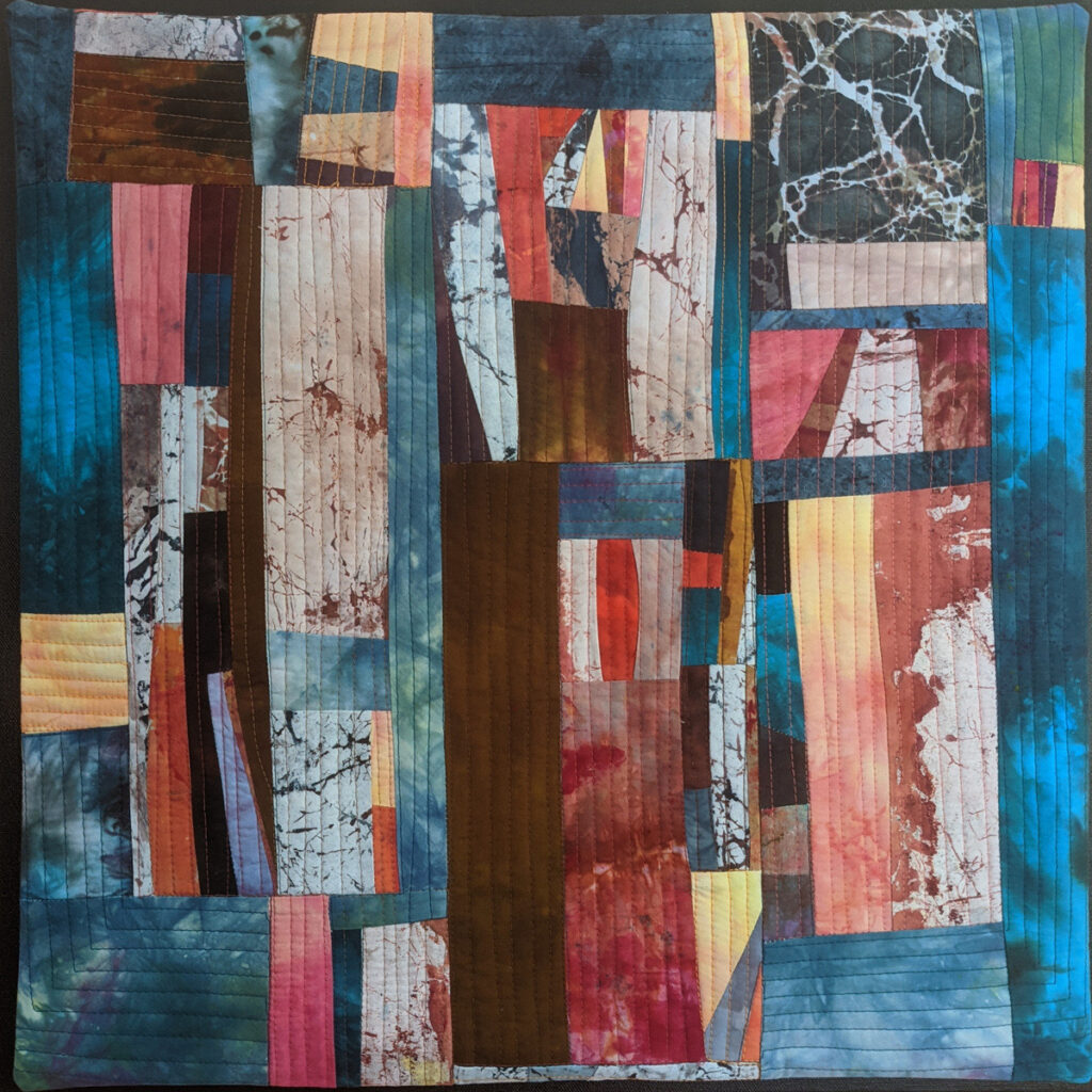 Barbara Behrmann • <em>Urban Impressions #1</em> • Dye-painted fabrics on stretched canvas • 20″×20″×1½″ • $400.00