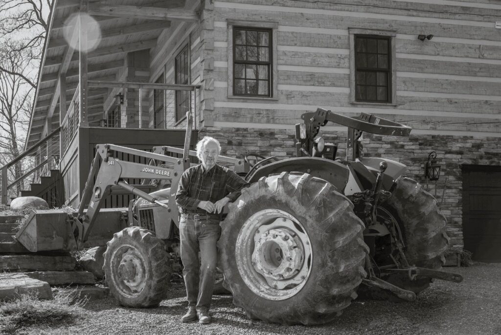 Susan C. Larkin • <em>Toby and his Tractor</em> • Archival digital print • 24″×18″ • $300.00