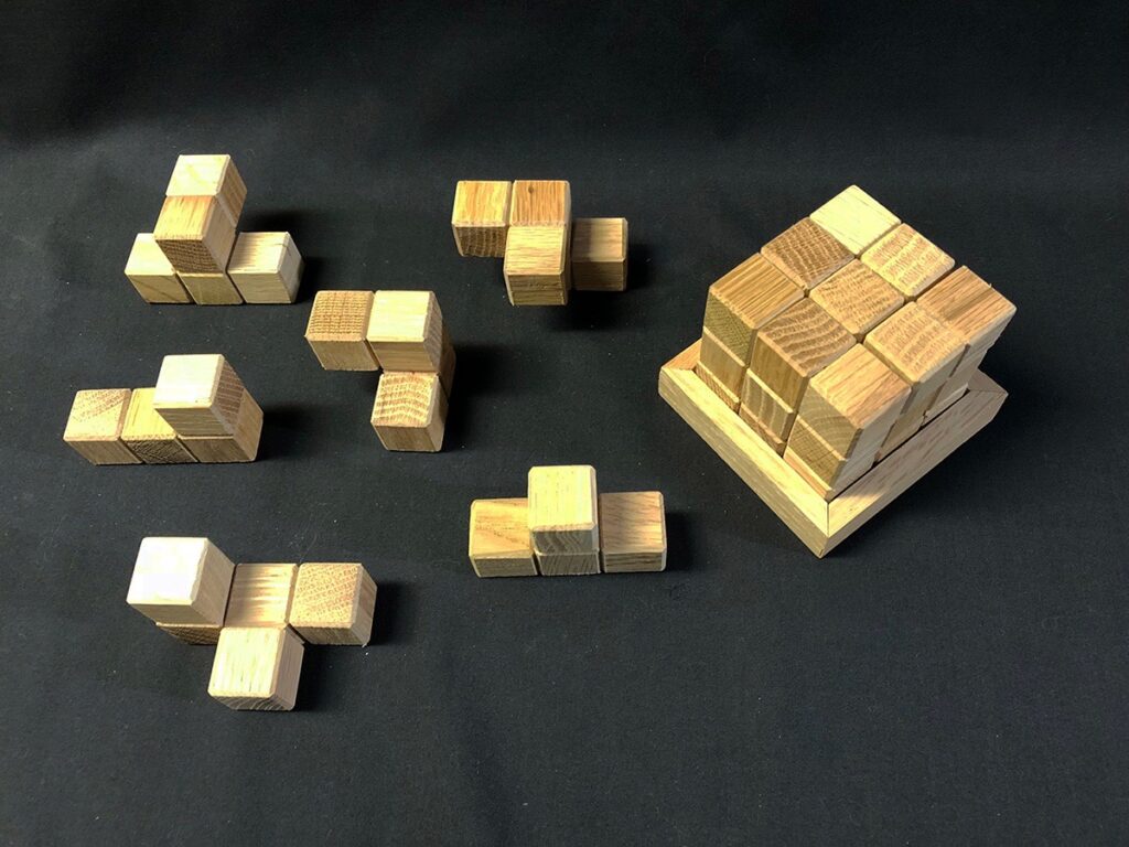 Eva M. Capobianco • <em>Block Puzzle</em> • Reused wood • 3″×3″×3″ • $15.00
