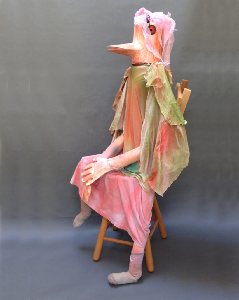 Mary Ann Bowman • <em>Bird with Chair</em> • Cloth, fabric, cardboard • 26″× 57″× 25″ • $1,599.00