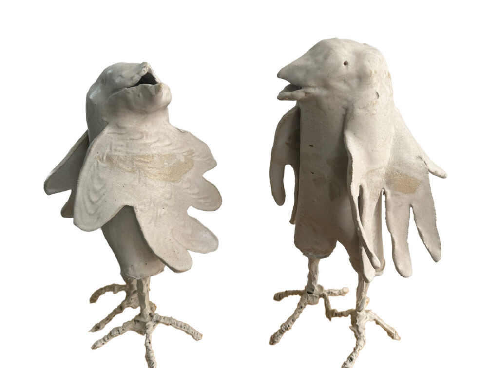 Mary Ann Bowman • <em>Chatting Birds (pair)</em> • Stoneware, wire • 15″× 11″× 6″ • $300.00