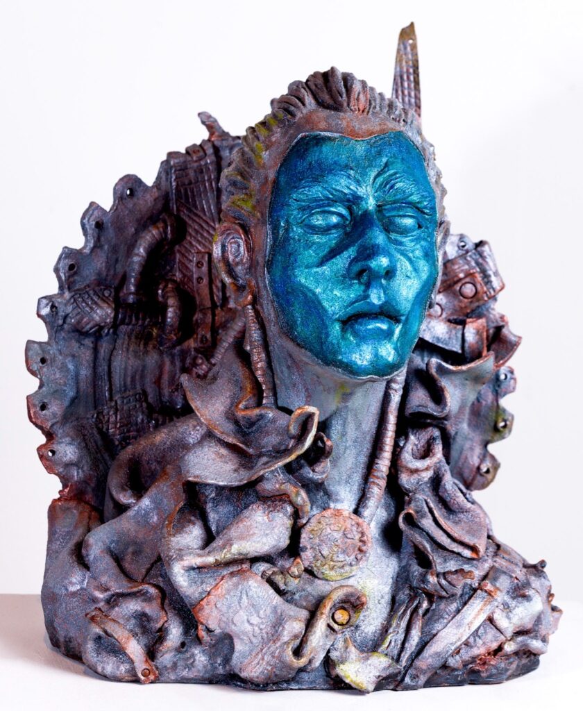 Andrew Fitzsimmons • <em>Master of Metropolis</em> • Stoneware clay with acrylic paint and wax patina • 18″× 28″× 12″ • $9,000.00<a class="purchase" href="https://state-of-the-art-gallery.square.site/product/andrew-fitzsimmons-master-of-metropolis/3495" target="_blank">Buy</a>