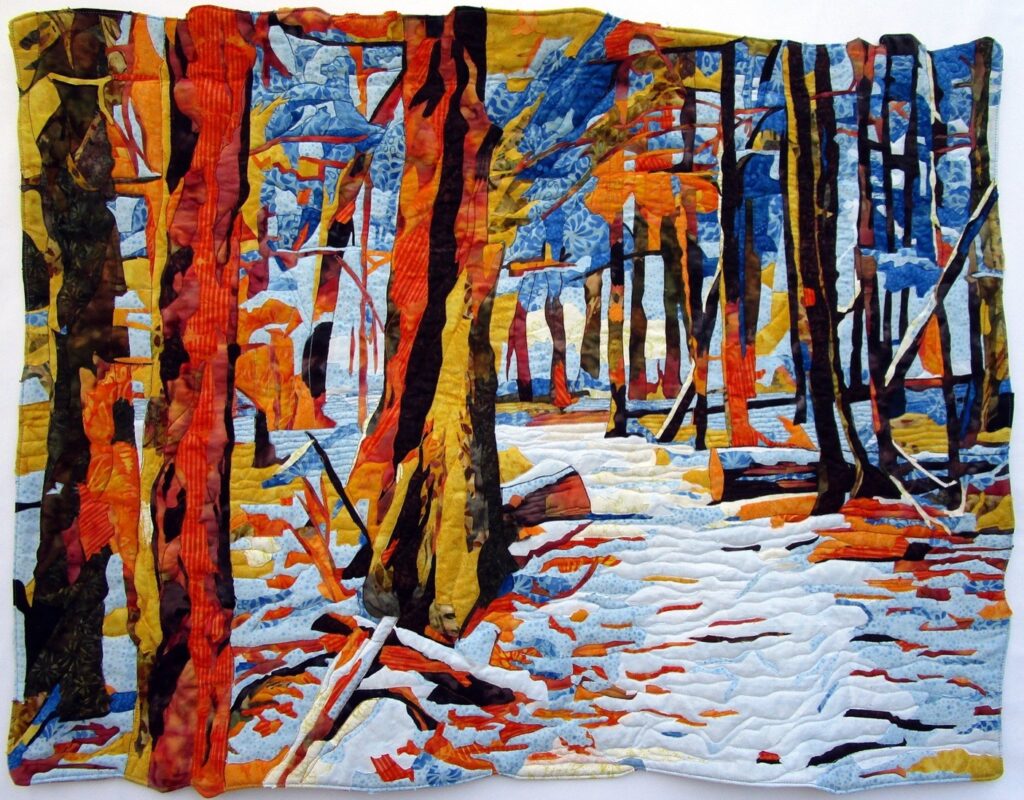 Jean Gerow • <em>Buttermilk Falls Trail</em> • Cotton batik fabric, thread and batting. • 34″× 26½″× ¼″ • $1,200.00<a class="purchase" href="https://state-of-the-art-gallery.square.site/product/jean-gerow-buttermilk-falls-trail/3498" target="_blank">Buy</a>