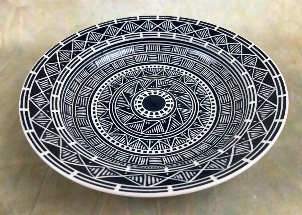 Perri LoPinto • <em>Black and White Serving Platter</em> • Stone ware clay • 11″× 3″× 11″ • $175.00<a class="purchase" href="https://state-of-the-art-gallery.square.site/product/perri-lopinto-black-and-white-serving-platter/3472" target="_blank">Buy</a>