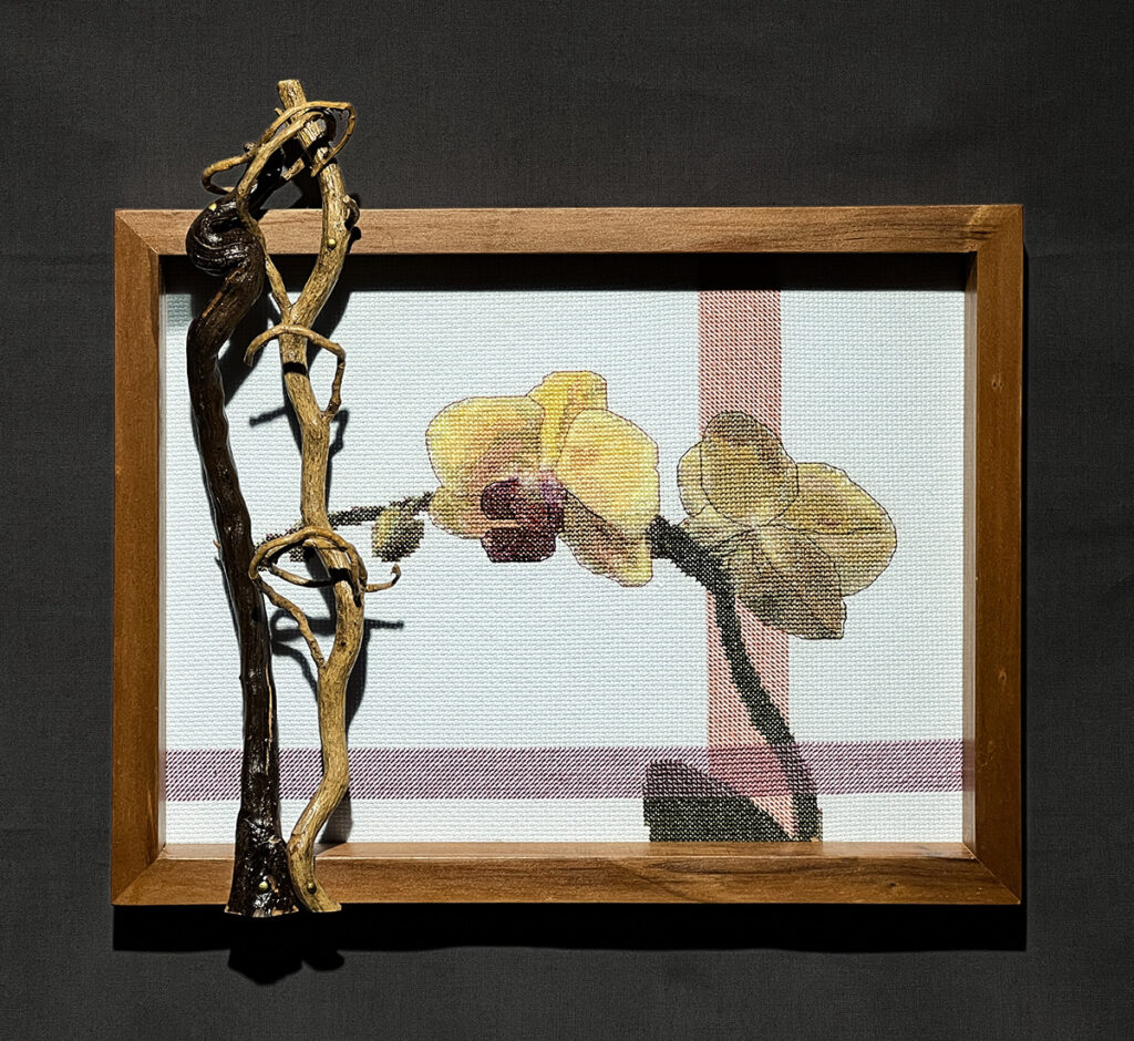 Eva M. Capobianco • <em>Orchids with Branch and Vine</em> • Cross stitch with found and reused wood • 13″× 12″× 4″ • $275.00