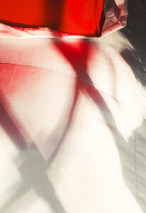 David Watkins, Jr • <em>Duvet, Red Purse, and Shadows</em> • Archival pigment print • 20″× 24″ • $275.00