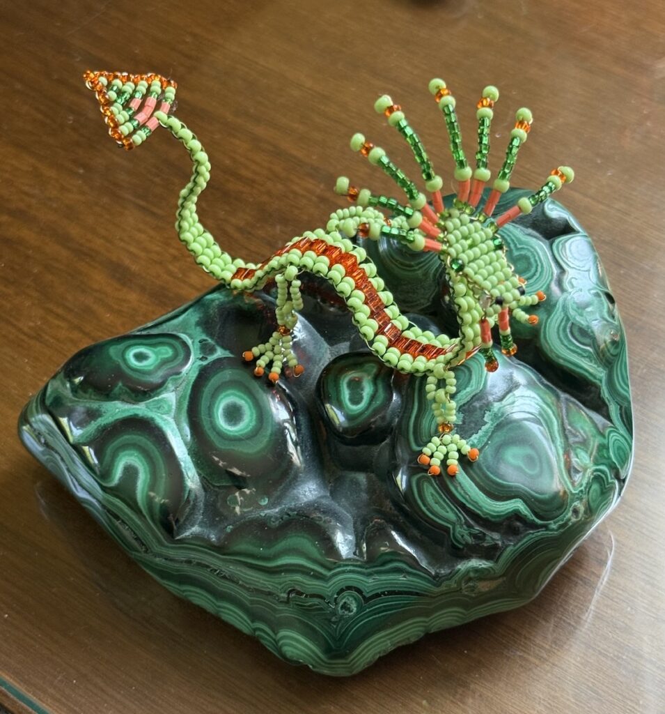 Frances L. Fawcett • <em>Green Dragon</em> • Glass beads, wire, stone • 5″× 4″× 5″ • NFS