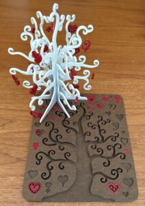 Frances L. Fawcett • <em>Heart Tree</em> • Masonite, paint, fish line • 9″× 10½″× 9″ • NFS