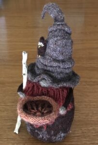 Frances L. Fawcett • <em>The Begging Bowl</em> • Wool, wood, beads, cotton thread • 8″× 4″× 4″ • NFS