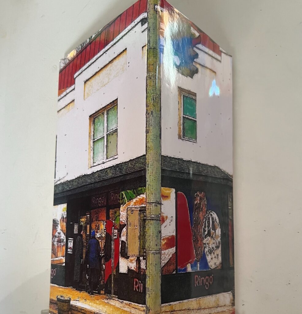 Arthur Really&nbsp;• <em>Corner Store</em>&nbsp;• Incidental photograph adhesive, construction grade insulation board, caulking/glue&nbsp;• 8″×&nbsp;12″×&nbsp;4″&nbsp;• $375.00<a class="purchase" href="https://state-of-the-art-gallery.square.site/product/arthur-really-corner-store/K52MSLMEPXPBXGQI63XBGMKS" target="_blank">Buy</a>