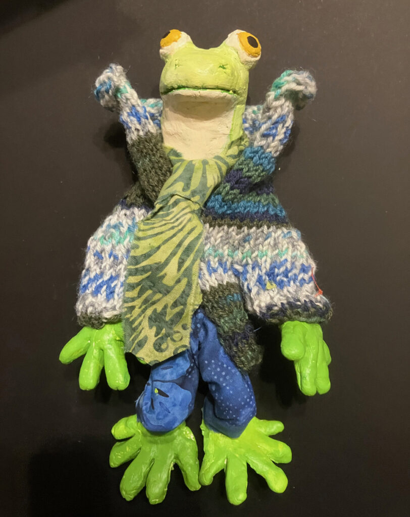 Margy Nelson&nbsp;• <em>Winter Wardrobe 6 (Frog)</em>&nbsp;• Mixed media&nbsp;• 8″×&nbsp;8″×&nbsp;3″&nbsp;• NFS