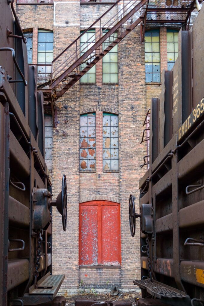 Rebecca Lewis&nbsp;• <em>Between Cars, Auburn, NY</em>&nbsp;• Digital print&nbsp;• 12″×&nbsp;18″&nbsp;• $500.00