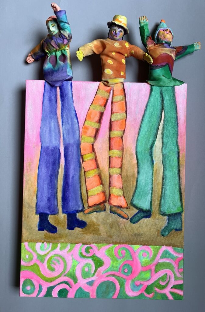 Jane Dennis&nbsp;• <em>Three Stilt Walkers</em>&nbsp;• Mixed media&nbsp;• 12″×&nbsp;22″&nbsp;• POR